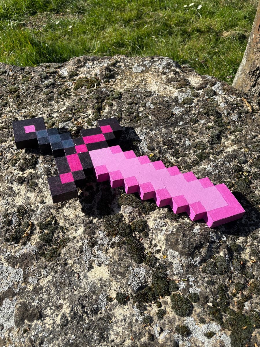 Hand-painted pixel-style sword in pink